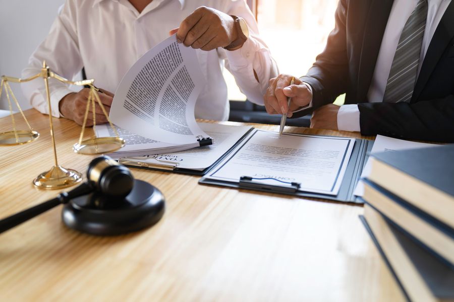 solicitor-seeing-contract-min.jpg
